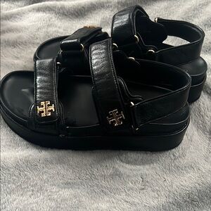 Tory Burch Black Sandals with Gold Accents